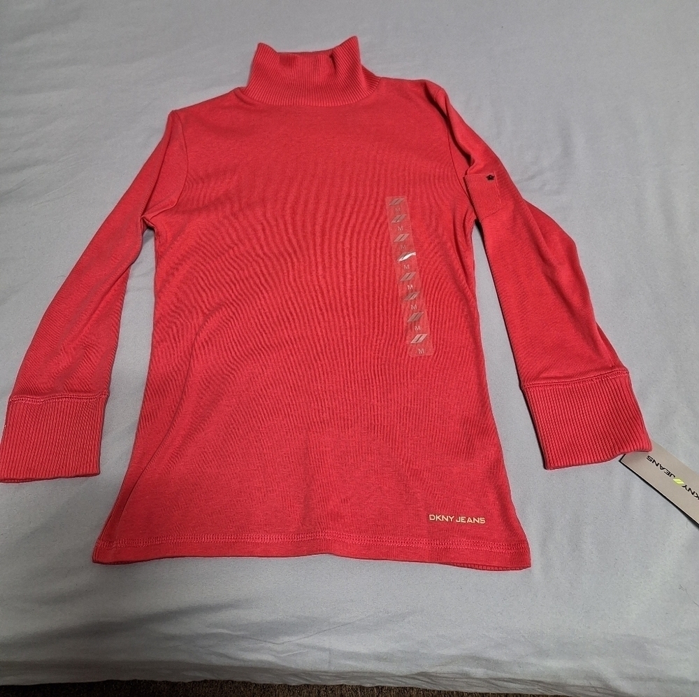 Dkny jeans turtleneck red coral pullover sweater in a ladies size medium.NWT.
